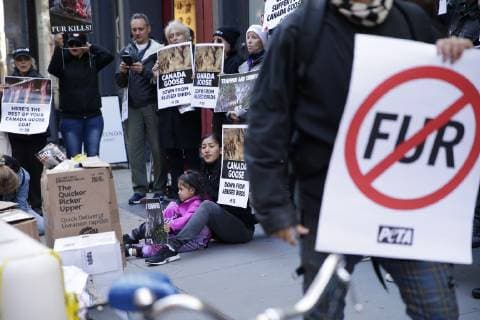 Topless Activists and PETA supporters hold a protest outside of Canada Goose in New York City on October 18, 2018.  NYP20181018104 JOHNxANGELILLO
