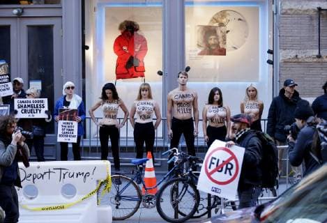 Topless Activists and PETA supporters hold a protest outside of Canada Goose in New York City on October 18, 2018.  NYP20181018108 JOHNxANGELILLO