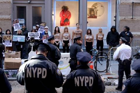 October 18, 2018 - New York City, New York, US - American animal rights organization, People for the Ethical Treatment of Animals (PETA) staged a protest action outside of Canada GooseÃ¢â‚¬â ¢s SOHO store on 18th. October 2018, highlighting the use of animal fur in the outer winter-wear company product line. New York City US - ZUMAl135 20181018_zap_l135_007 Copyright: xG.xRonaldxLopezx