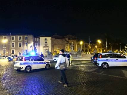 (181023) -- ROME, Oct. 23, 2018 -- Police cars are seen near the metro station where an escalator collapsed in Rome, Italy, on Oct. 23, 2018. At least 20 Russian football fans were injured when an escalator at a busy Rome metro station collapsed on Tuesday night, local media reported. ) ITALY-ROME-METRO-ESCALATOR-COLLAPSE ChenxZhanjie 