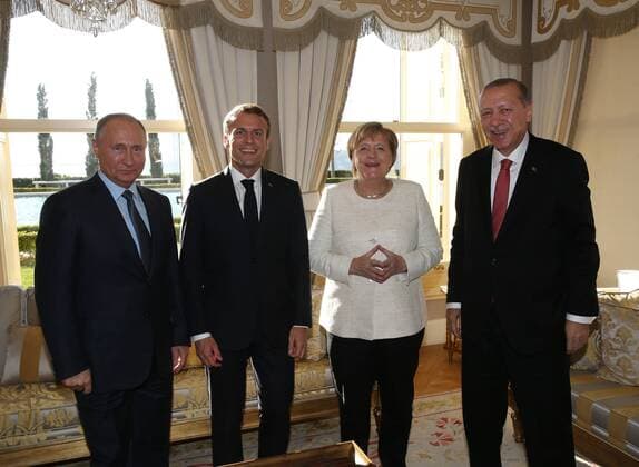 ISTANBUL, TURKEY - OCTOBER 27: President of Turkey, Recep Tayyip Erdogan (R), Russian President Vladimir Putin (L), French President Emmanuel Macron (2L) and German Chancellor Angela Merkel (2R) meet within the Four-way Istanbul summit on Syria , at Vahdettin Mansion in Istanbul, Turkey on October 27, 2018. The summit on Syria, hosted by Turkish President Recep Tayyip Erdogan, will see the participation of Russian President Vladimir Putin, German Chancellor Angela Merkel and French President Emmanuel Macron. (  Copyright: PresidencyxPressxService 44668134765_8fae316ec3_o
