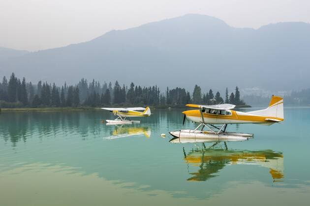 Float planes moored on Green Lake, Whistler, British Columbia, Canada, Whistler British Columbia Canada Copyright: BenxGirardi GIEN003750