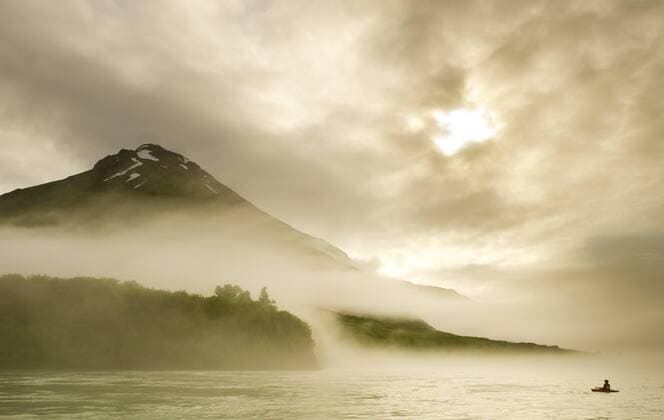 Long Exposure Of Kayaker During Marine Fog On The Alsek River, Alsek River Alaska Yukon USA Canada model released Symbolfoto Copyright: JoshxMillerxPhotography MIOS001208