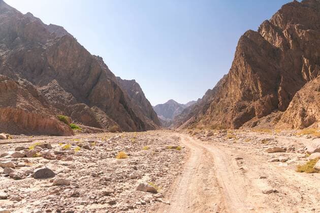 View of road between mountains during daytime, St Catherine, South of Sinai, Egypt, St Cathrin South of Sinai Egypt Copyright: TambolyxPhotodesign TAAH000166