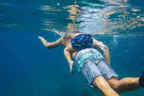 Father and son diving under water,Bali,Indonesia, Amed Bali Indonesia model released Symbolfoto Copyright: KonstantinxTrubavin TRKO021436