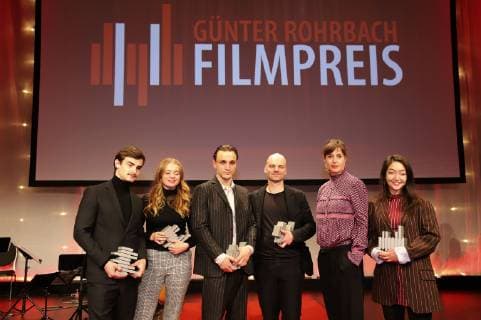 Aaron Hilmer, Luna Wedler, Franz Rogowski, Thomas Stuber, Susanne Wolff und Mia Spengler bei der 8. Verleihung des Günter Rohrbach Filmpreises 2018 in der Neuen Gebläsehalle Neunkirchen. Neunkirchen, 02.11.2018