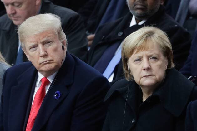 PARIS, FRANCE - NOVEMBER 11, 2018: US President Donald Trump (L) and Germany s Chancellor Angela Merkel attend a ceremony to celebrate the 100th anniversary of the end of the First World War at the Triumphal Arch on the Elysian Fields in Paris. Mikhail Metzel TASS  TS097029
