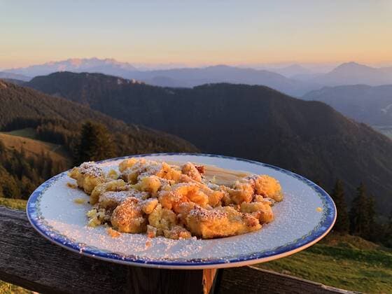 Mountainbike , Traunstein, September 20, 2018 A woman on a mountain bike cycling up to the mountainhut enjoy a Kaiserschmarrn at the Hochgernhaus 1461m in the alps of Chiemgau in Marquartstein near Traunstein, Bavaria, Germany, September 20, 2018. Photographer: Peter Schatz MAGICS