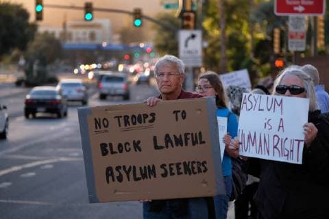 November 13, 2018 - Tucson, Arizona, USA - Pro immigrants rights protest in Tucson in support of the migrant caravan traveling through Mexico towards the US border. They denounced the stationing of US troops by President Trump on the border to hault the caravan if they reach the Arizona and support the migrants rights to apply for asylum. Tucson USA - ZUMAb411 20181113_zap_b411_009 Copyright: xChristopherxBrownx