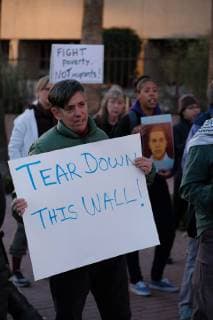 November 13, 2018 - Tucson, Arizona, USA - Pro immigrants rights protest in Tucson in support of the migrant caravan traveling through Mexico towards the US border. They denounced the stationing of US troops by President Trump on the border to hault the caravan if they reach the Arizona and support the migrants rights to apply for asylum. Tucson USA - ZUMAb411 20181113_zap_b411_012 Copyright: xChristopherxBrownx