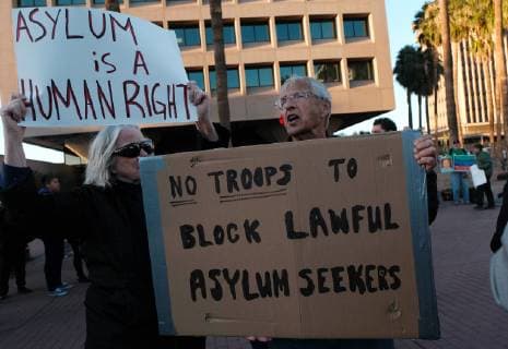 November 13, 2018 - Tucson, Arizona, USA - Pro immigrants rights protest in Tucson in support of the migrant caravan traveling through Mexico towards the US border. They denounced the stationing of US troops by President Trump on the border to hault the caravan if they reach the Arizona and support the migrants rights to apply for asylum. Tucson USA - ZUMAb411 20181113_zap_b411_003 Copyright: xChristopherxBrownx