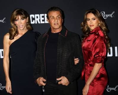 November 14, 2018 - New York City, New York, U.S. - Actor SYLVESTER STALLONE with (L) JENNIFER FLAVIN and daughter (R) SCARLET ROSE STALLONE attend the World Premiere of Creed ll held at the AMC Lincoln Square Theater. New York City U.S. - ZUMAk03_ 20181114_zaf_k03_177 Copyright: xNancyxKaszermanx