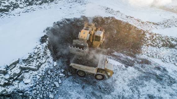 (181115) -- MOSCOW, Nov. 15, 2018 -- A mining excavator loads a truck in an open pit diamond mine in Republic of Sakha (Yakutia), Russia, on Nov. 13, 2018. Alrosa, the world s leading diamond miner, has operations in Republic of Sakha (Yakutia) and Arkhangelsk region, running 11 kimberlite pipes and 16 alluvial deposits in the harsh climate of the Russian Far North. )(yy) RUSSIA-ALROSA-DIAMOND MINING BaixXueqi 