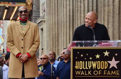 Rap singer, actor, musician and performer Snoop Dogg reacts to comments by record producer Dr. Dre during an unveiling ceremony honoring him with the 2,651st star on the Hollywood Walk of Fame in Los Angeles on November 19, 2018.  LAP2018111922 JIMxRUYMEN