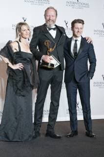 USA: 46th Annual International Emmy Awards Lars Mikkelsen winner for the Best Performance by an Actor pose with Mary Stuart Masterson & Ben McKenzie during the 46th International Emmy Awards at Hilton hotel New York New York United States Hilton hotel  LevxRadin