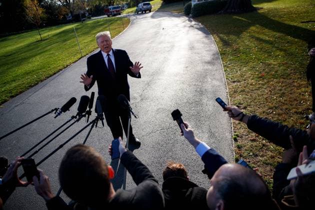 (181120) -- WASHINGTON, Nov. 20, 2018 -- U.S. President Donald Trump speaks to reporters before departing from the White House in Washington D.C., the United States, on Nov. 20, 2018. Donald Trump has submitted written answers to questions from Special Counsel Robert Mueller probing into the alleged Russian meddling in the 2016 U.S. elections, local media on Tuesday quoted the president s attorneys as saying. ) U.S.-WASHINGTON D.C.-TRUMP-MUELLER-RUSSIA PROBE TingxShen 