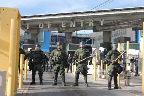 November 22, 2018 - San Ysidro, CA, United States of America - U.S. Customs and Border Patrol agents with riot shields temporarily shut all lanes into the United States from Mexico at the San Ysidro crossing during a show of force readiness exercise in preparation for the migrant caravan November 22, 2018 in San Ysidro, California. San Ysidro United States of America - ZUMAp138 20181122_zaa_p138_020 Copyright: xShawnxMoorex