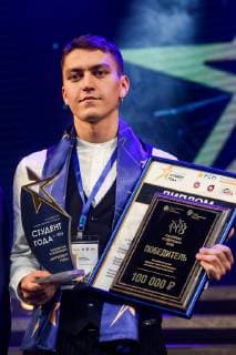 KAZAN, RUSSIA - NOVEMBER 23, 2018: Daniil Kirsanov receives the Student of the Year 2018 Prize in the Intellect of the Year category during the award ceremony for Student of the Year Prize winners at Volga Region State Academy of Physical Culture, Sport and Tourism; established by the Cabinet of Ministers of Russia s Republic of Tatarstan and the Russian Union of Youth, the Student of the Year Prize is awarded annually in a number of categories to higher education students who win three rounds of competitions. Yegor Aleyev TASS  TS098894