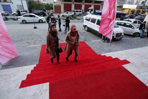November 26, 2018 - Gaza City, Gaza Strip, Palestinian Territory - Palestinians walk on a red carpet during 4th Annual Red Carpet Festival for Human Rights Films in Gaza City on November 26, 2018. The Red Carpet Festival is held in the Gaza Strip for the fourth year in a raw with the Hash-Tag of the festival will be enough Gaza City Palestinian Territory - ZUMAap3_ 20181126_zaf_ap3_105 Copyright: xAshrafxAmrax