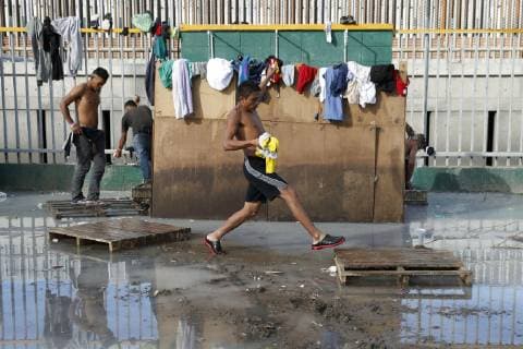 Migrant caravan Migrants from Central America are pictured at a shower facility in Tijuana, Mexico, on Nov. 28, 2018. 
