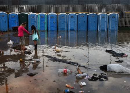 November 29, 2018 - Tijuana, Mexico - People navigate severe flooding at the migrant caravan camp Centro Deportivo Benito Juarez on November 29, 2018. It is being called a humanitarian crisis. We lost everything, said a migrant walking through debris. Many migrants appeared to realize that the hope they held to begin a new life in America had dimmed and their stay in Mexico may be longer than anticipated. Tijuana Mexico - ZUMAg208 20181129_zap_g208_002 Copyright: xCarolxGuzyx