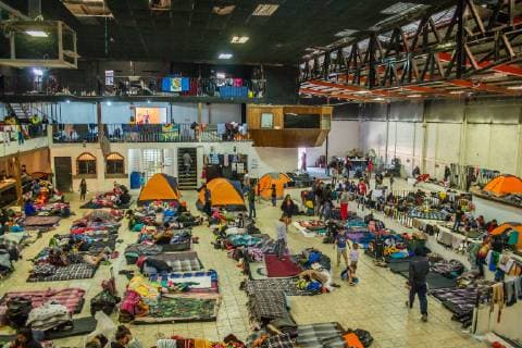 December 2, 2018 - Aslyum seekers from the Migrant Caravan set up camp inside El Barretall, the new makeshift shelter in Tijuana,Mexico on December 2, 2018. There are roughly 300-500 children and families currently inside the main building on site. El Barretal, is a dancel hall event space and located a few miles from the border, has been designated as the shelter for the Central Americans. The number of migrants is over 1,000 and rising at the camp. - ZUMAs157 20181202_znp_s157_010 Copyright: xVitoxDixStefanox