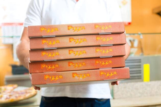  delivery - man with pizza boxes model released Symbolfoto property released  Copyright: xKzenonx Panthermedia08563574