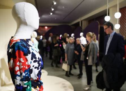 MOSCOW, RUSSIA - DECEMBER 4, 2018: A dress on display at an exhibition titled The Glamour of the 80s by Russian fashion historian Alexandre Vassiliev opened at the VDNKh exhibition centre. The exhibition shows a unique collection of the 1980s costumes by Chanel, Christian Dior, Yves Saint Laurent, Givenchy, Pierre Balmain, Claude Montana, and other fashion houses. Mikhail Tereshchenko TASS  TS099C8A