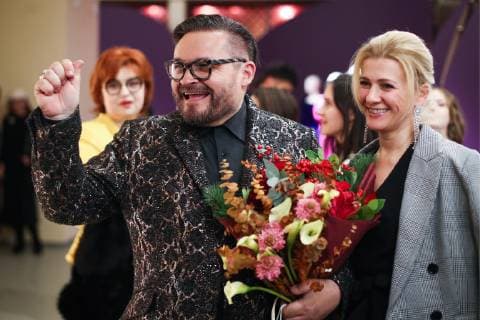 MOSCOW, RUSSIA - DECEMBER 4, 2018: Russian fashion historian Alexandre Vassiliev at the opening of his exhibition titled The Glamour of the 80s at the VDNKh exhibition centre. The exhibition shows a unique collection of the 1980s costumes by Chanel, Christian Dior, Yves Saint Laurent, Givenchy, Pierre Balmain, Claude Montana, and other fashion houses. Mikhail Tereshchenko TASS  TS099CBB