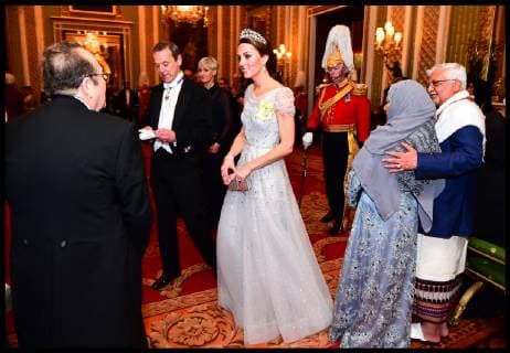 . 04 12 2018. London, United Kingdom. Diplomatic Reception. The Duchess of Cambridge talks to guests at an evening reception for members of the Diplomatic Corps at Buckingham Palace in London.  xi-Imagesx xPoolx IIM-18966-0010