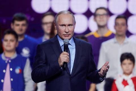 MOSCOW, RUSSIA - DECEMBER 5, 2018: The President of Russia Vladimir Putin (front) and Dobrovolets Rossii prize winners at the 2018 Dobrovolets Rossii (Volunteer of Russia) award ceremony at CSKA Arena on International Volunteer Day; the event is part of the 2018 International Volunteer Forum. Mikhail Metzel TASS  TS099E54