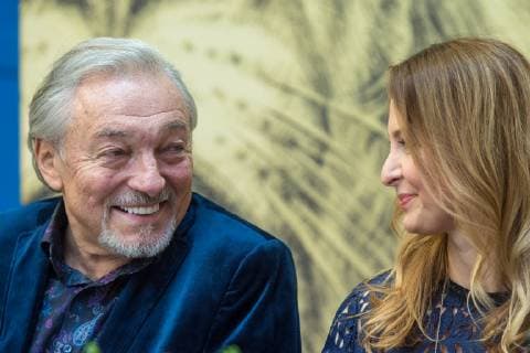 Czech famous singer Karel Gott (left) solemnly coined gold and silver medals with his own portrait for the series Slavici ve zlate (Nightingales in gold) in the Czech Mint, on December 5, 2018, in Jablonec nad Nisou, Czech Republic. On the right side is seen his wife Ivana Gottova. (CTKxPhoto RadekxPetrasek) CTKPhotoP201812050511901  PER 7