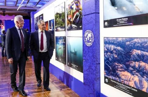 MOSCOW, RUSSIA - DECEMBER 7, 2018: Volga Group owner, businessman Gennady Timchenko (L), and Russia s Defence Minister Sergei Shoigu at an exhibition of the winning entries of the Russian Geographical Society s The Most Beautiful Country photography competition at the State Kremlin Palace, the venue of the 2018 Russian Geographical Society Prize award ceremony. Anton Novoderezhkin TASS  TS09A49A