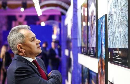 MOSCOW, RUSSIA - DECEMBER 7, 2018: Russian Geographical Society President, Russia s Minister of Defence Sergei Shoigu at an exhibition of the winning entries of the Russian Geographical Society s The Most Beautiful Country photography competition at the State Kremlin Palace, the venue of the 2018 Russian Geographical Society Prize award ceremony. Anton Novoderezhkin TASS  TS09A49C