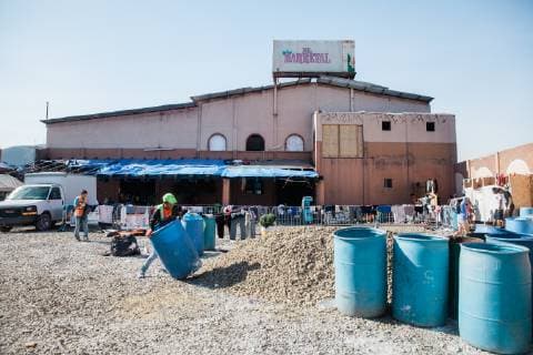 The front of El Barretal shelter located in the eastern part of Tijuana, Mexico on December 9, 2018. The building is catered to families so they can stay together. El Barretal is an abandoned concert hall that can house 7,500 people. The makeshift shelter is not even half full.  TJ2018120920 ARIANAxDREHSLER