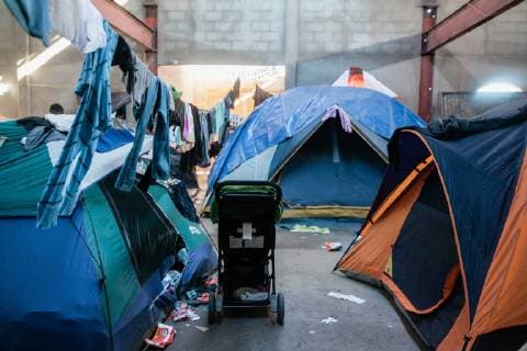 El Barretal shelter in Tijuana, Mexico on December 9, 2018. El Barretal is an abandoned concert hall that has the capacity to house 7,500 people but it s not even half full.  TJ2018120912 ARIANAxDREHSLER