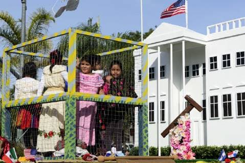 December 9, 2018 - Los Angeles, California, United States - A float with children in a cage and a replica of the White House, in opposition to the Trump administration s detention of illegal immigrants, takes part in the procession honoring Our Lady of Guadalupe in Los Angeles, California on December 9, 2018. Los Angeles United States - ZUMAn230 20181209_zaa_n230_562 Copyright: xRonenxTivonyx
