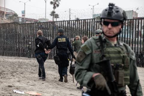 Department of Homeland Security police arrest a demonstrator at Border Field State Park in San Diego, California on December 10, 2018.  SDP2018121043 ARIANAxDREHSLER