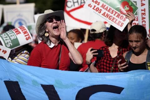 December 15, 2018 - Los Angeles, California, United States - Teachers and supporters of public education march against education funding cuts during the March for Public Education in Los Angeles, California on December 15, 2018. The rally, organized by United Teachers Los Angeles, drew thousands of educators who demanded wage increases and smaller class sizes. Los Angeles United States - ZUMAn230 20181215_zaa_n230_898 Copyright: xRonenxTivonyx