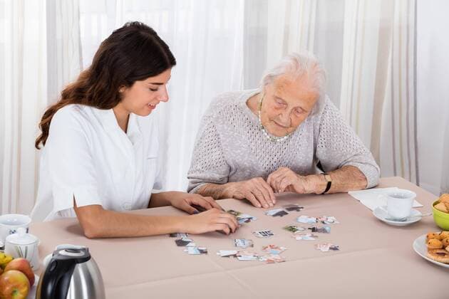  Two Women Playing Jigsaw Puzzle model released Symbolfoto  Copyright: xAndreyPopovx Panthermedia19195209