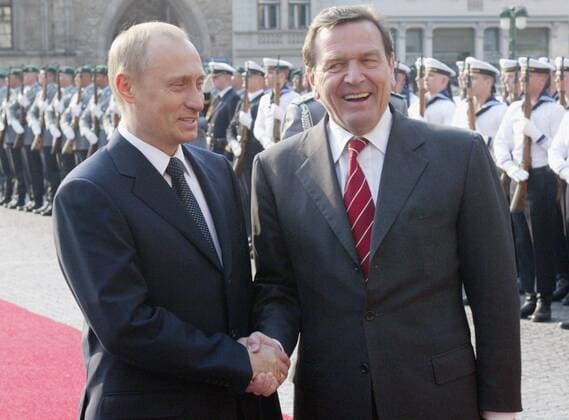 German Chancellor Gerhard Schroeder, right, welcomes Russian President Vladimir Putin in Weimar, eastern Germany, Tuesday, April 9, 2002. Putin is on a two-day visit in Weimar for the German Russian consultations. ( Eckehard Schulz) WEIMAR DEU *** German Chancellor Gerhard Schroeder right welcomes Russian President Vladimir Putin in Weimar eastern Germany Tuesday April 9 2002 Putin is on a two day visit in Weimar for the German Russian consultations Eckehard Schulz WEIMAR DEU