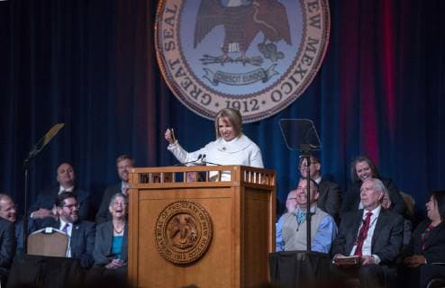 January 1, 2019 - U.S. - New Mexico Governor Michelle Lujan Grisham tells a funny story about almost loosing a pen her father gave her during her inaugural address at the inaugural ceremony in Santa Fe, Tuesday January 1, 2019. Behind them upper right, is Congressman Ben Ray Lujan, center, and other state officials. U.S. - ZUMAab1_ 20190101_zaf_ab1_025 Copyright: xEddiexMoorex