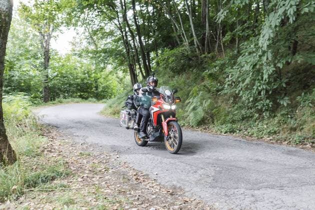Father and son on a motorbike trip on a country road model released Symbolfoto  FBAF00131