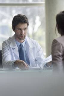 Doctor explaining concerning results to patient  Copyright: EricxAudras B23675224