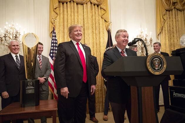 January 14, 2019 - Washington, DC, United States of America - U.S Senator Lindsey Graham of South Carolina delivers remarks as President Donald Trump and Vice President Mike Pence look on during a celebration for the 2018 NCAA College Football National Champion Clemson Tigers in the East Room of the White House January 14, 2019 in Washington, DC. Washington United States of America - ZUMAp138 20190114_zaa_p138_006 Copyright: xJoycexN.xBoghosianx