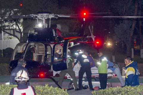 (190119) -- MEXICO CITY, Jan. 19, 2019 -- MEXICO-HIDALGO-PIPELINE-EXPLOSION Paramedics move an injured person onto a helicopter after a pipeline explosion in the municipality of Tlahuelilpan, Hidalgo state, Mexico, Jan. 18, 2019. At least 20 people were killed and 54 others injured in a pipeline explosion in the central Mexican state of Hidalgo on Friday, local authorities said. ) MEXICO-HIDALGO-PIPELINE-EXPLOSION STR 