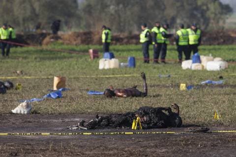 January 19, 2019 - Tlahuelipan, Hidalgo, MEXICO - Saturday, January 19, 2019. Experts from the General Prosecutor Office of Mexico are working on the recovery and identification of bodies in the area where yesterday a Pemex pipeline exploded by a clandestine taking of the gasoline by of huachicoleros that went out of control and left 67 dead, so far, in the San Primitivo community, municipality of Tlahuelilpan, Hidalgo. ANTONIO NAVA PI Tlahuelipan MEXICO - ZUMAp124 20190119_zaa_p124_033 Copyright: xAntonioxNavax