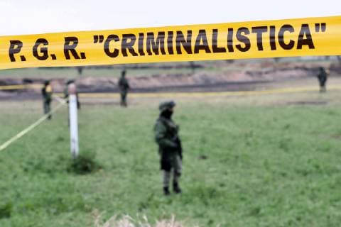 Mexiko, Untersuchungen nach Explosion einer Pipeline in Tlahuelipan January 20, 2019 - EUM20190120NAC06.JPG .TLAHUELILPAN, Hgo. ExplosionExplosion-Ducto.- 20 de enero de 2019. Elementos de la Secretaria de la Defensa Nacional resguardan el predio en donde hace tres dias exploto una toma clandestina en el ducto de Pemex de este municipio, que hasta el momento ha dejado 79 fallecidos y 81 lesionados. Foto: Agencia EL UNIVERSALValente RosasEELG Copyright: xElxUniversalx