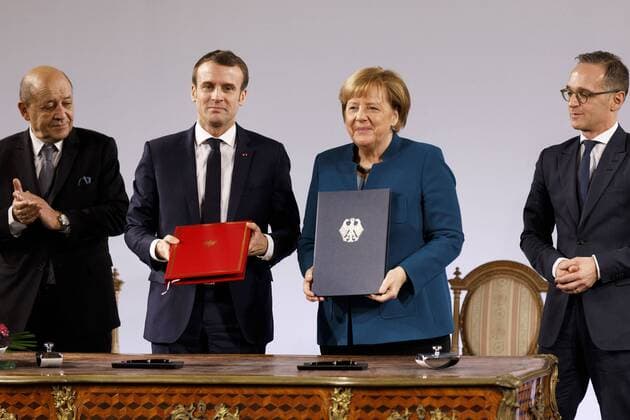 Jean-Yves Le Drian, Emmanuel Macron, Angela Merkel und Heiko Maas bei der Erneuerung des deutsch-französischen Freundschaftsvertrages im Rathaus. Aachen, 22.01.2019 *** Jean Yves Le Drian Emmanuel Macron Angela Merkel and Heiko Maas at the renewal of the German-French friendship contract in the Aachen City Hall 22 01 2019 Foto:xC.xHardtx xFuturexImage