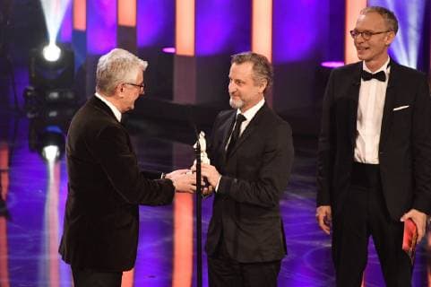 Marcel Reif, Robert Marciniak und Christoph Süß bei der Verleihung des 40. Bayerischen Filmpreises 2018 im Prinzregententheater. München, 25.01.2019